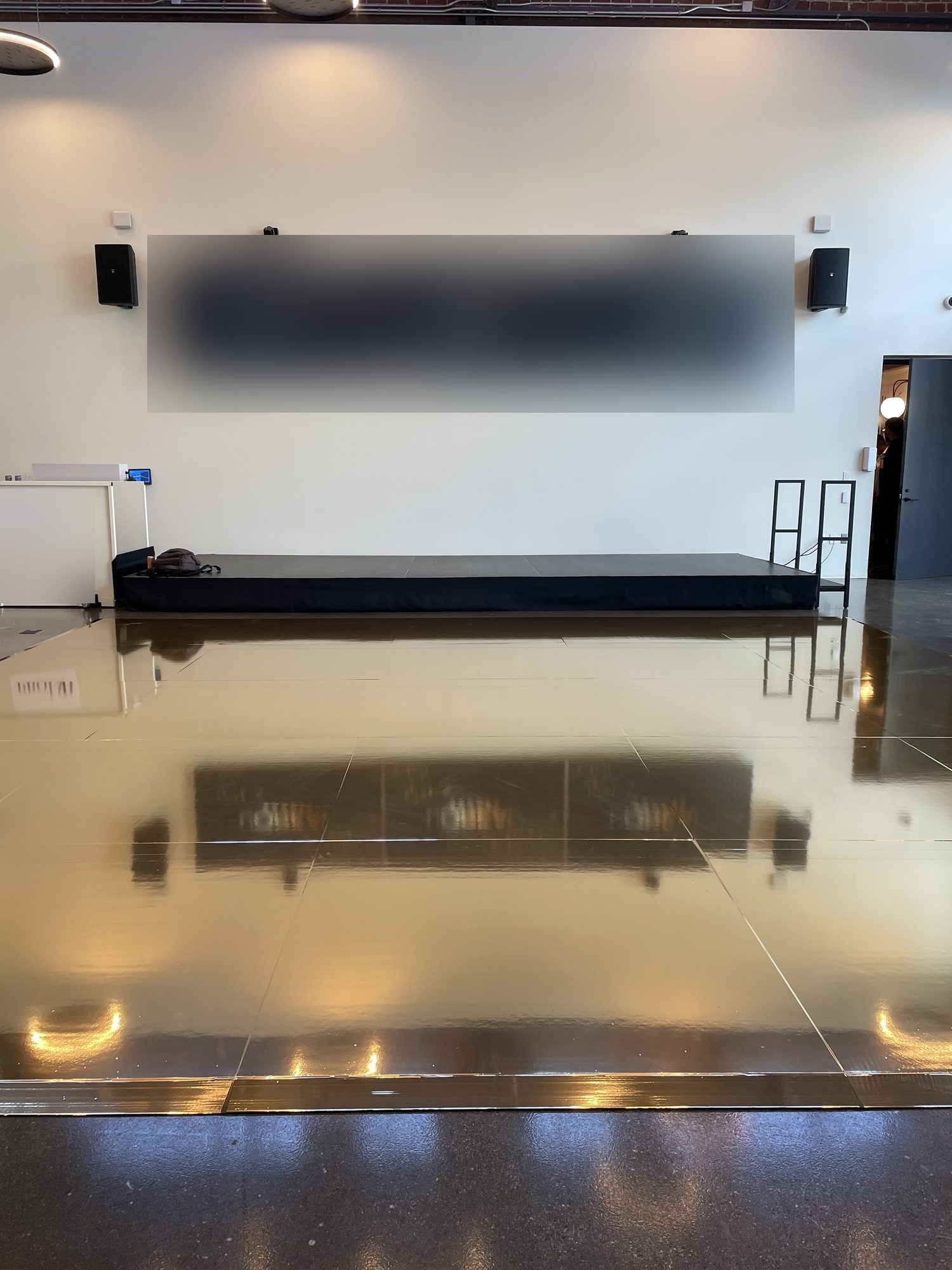 Gold mirror metallic vinyl dance floor, cut to size for a corporate event